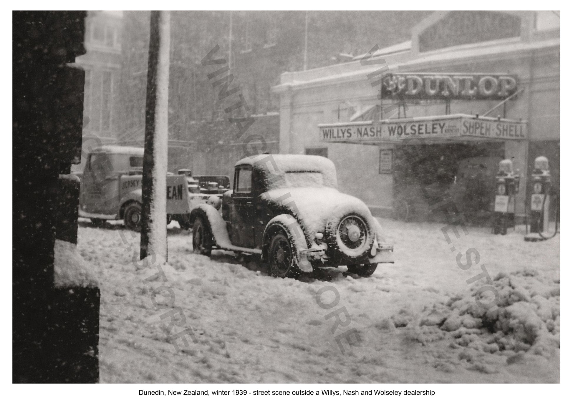 Dunedin, New Zealand, winter 1939 - street scene outside a Willys, Nash and Wolseley motor dealership